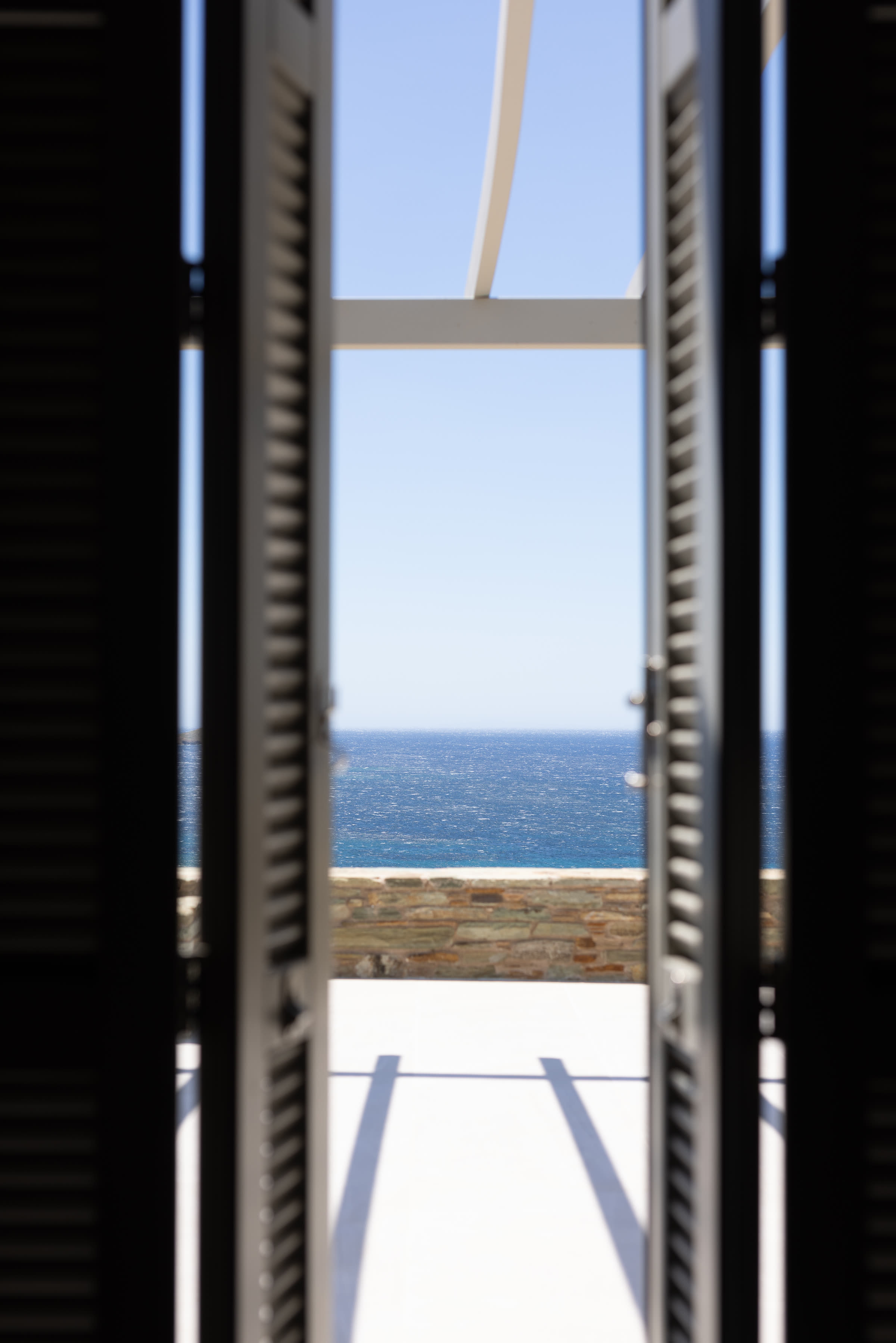 Sea view through shutters